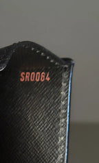 Vue du code d'authentification sac Louis Vuitton Monceau 