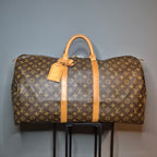 Louis Vuitton Keepall 55 Monogram marron et cuir naturel vue de face