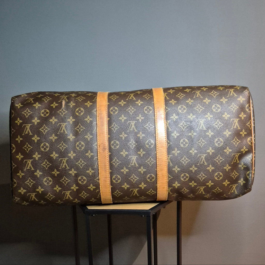 Louis Vuitton Keepall 55 Monogram marron vue dessous 
