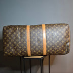 Louis Vuitton Keepall 55 Monogram marron vue dessous 