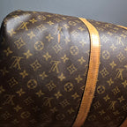 Louis Vuitton Keepall 55 Monogram vue defaut