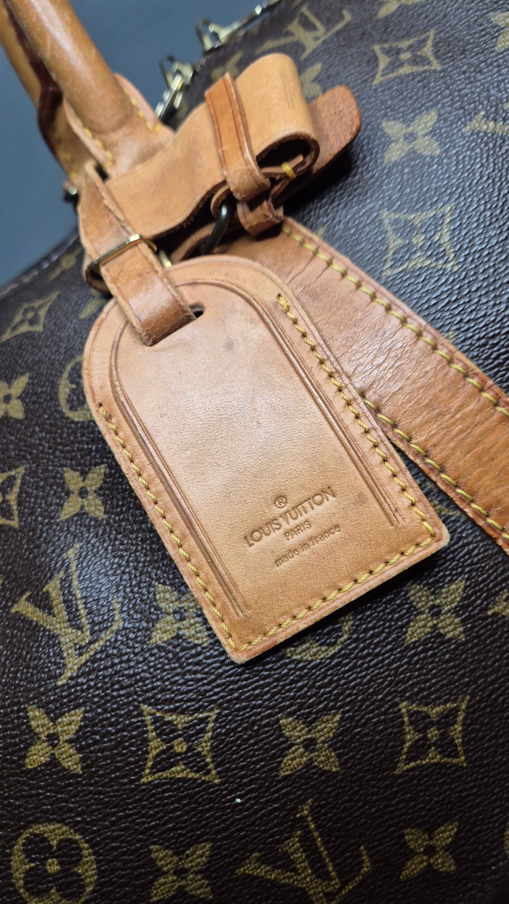 Louis Vuitton Keepall 55 Monogram vue porte-nom 