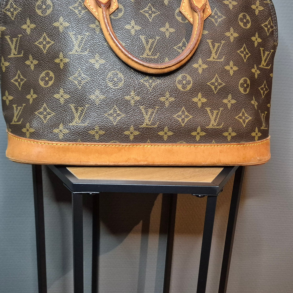 Louis Vuitton Alma Monogram marron partie cuir naturel 
